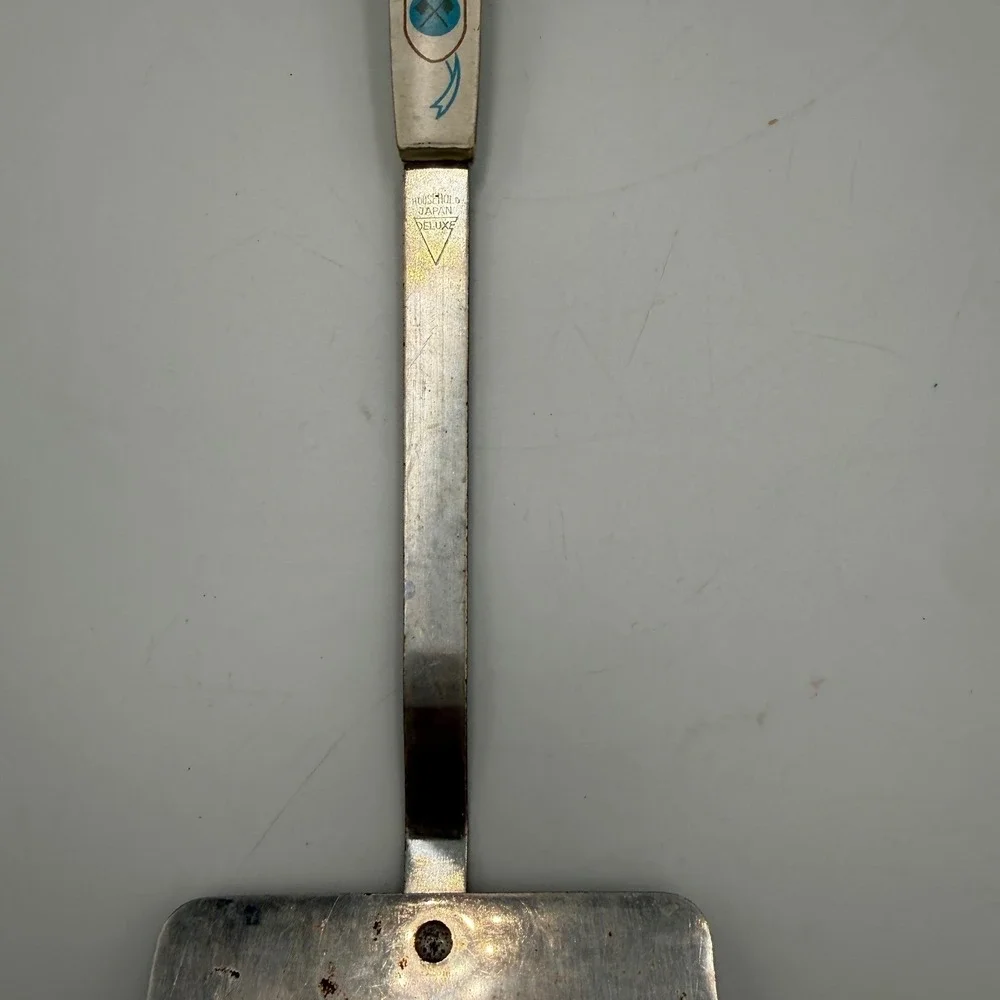 Vintage Household Japan Deluxe Spatula Heraldic Crest White Handle Stainless